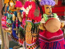 Set of multicoloured woven dolls made of maize. 